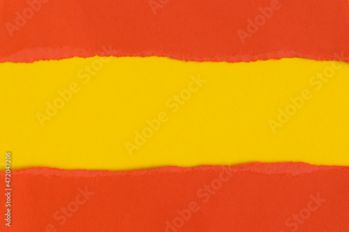 Red torn paper with space for text with yellow background