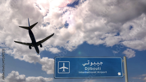 Plane landing in Djibouti Jibuti airport with signboard photo