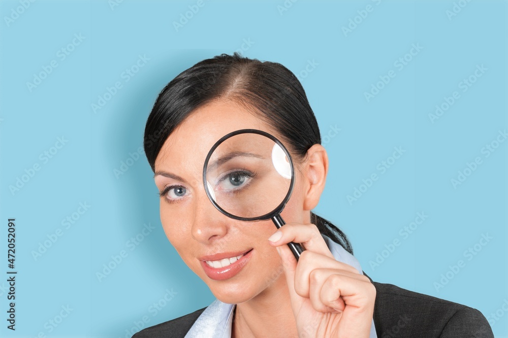 Photo of young cheerful girl look watch loupe enlarge detective Photo of young cheerful girl look watch loupe enlarge detective