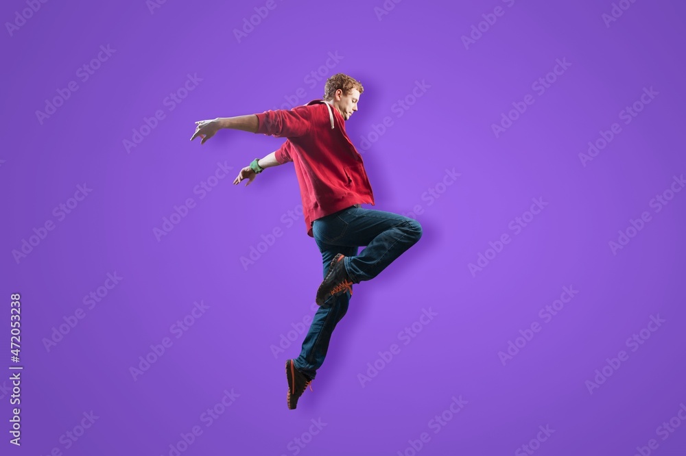 Happy young crazy man jump up to celebrate