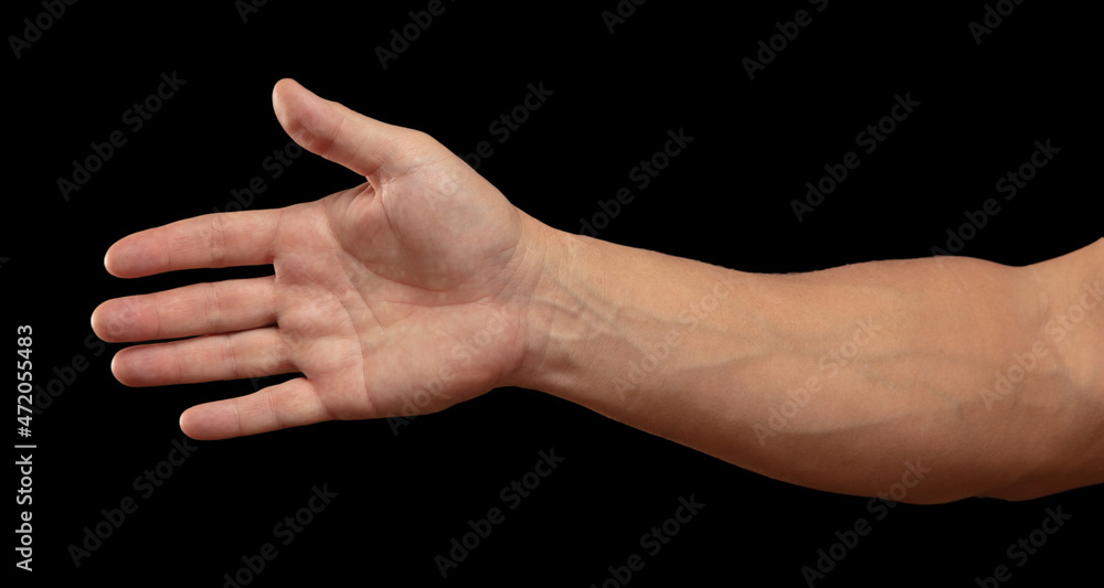 Man's hand on a black background.
