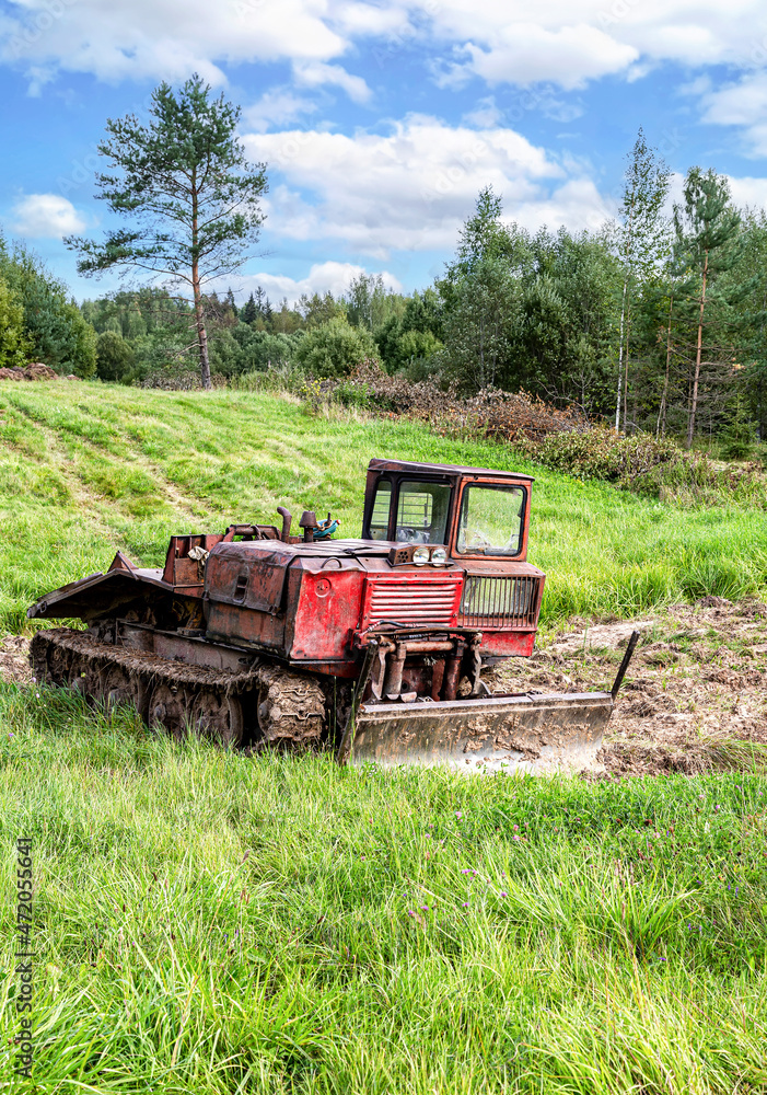 Fototapeta premium Old skidder at the outdoors in summertime