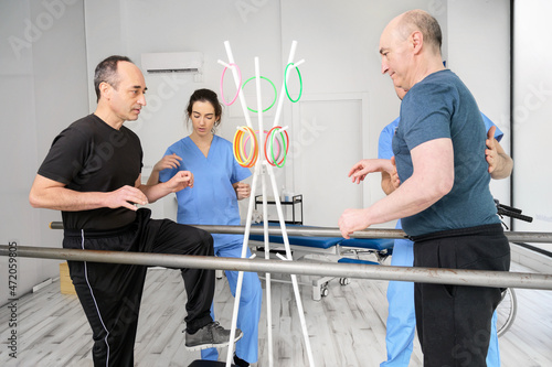 Group of People with disability exercising at rehabilitation clinic. High quality photo photo