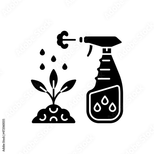 Spray fertilizer black glyph icon. Liquid substance for plant leaves. Foliar supplement. Pesticide spraying. Nourish additive. Silhouette symbol on white space. Vector isolated illustration