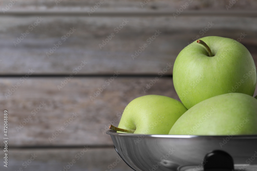 Ripe green apples on wooden background, closeup. Space for text Ripe green apples on wooden background, closeup. Space for text