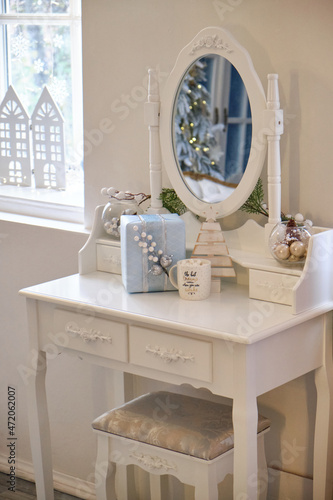 New Year's or Christmas interior decor on white Table Boudoir. © Inna Vlasova
