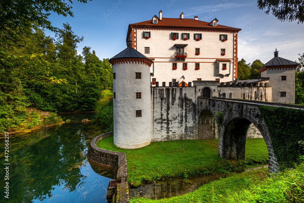 Sneznik Castle in Slovenia. Picturesque Flowing Castle Reflection in Pond