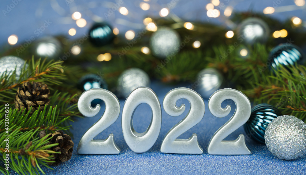 Christmas composition with number 2022. Christmas tree and New Year decorations. Happy New Years 2022. New Year concept. Close-up. Christmas composition with number 2022. Christmas tree and New Year decorations. Happy New Years 2022. New Year concept. Close-up.