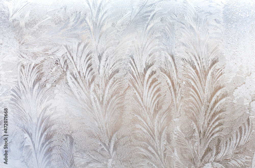 Frosty pattern on the window. Ice pattern. Frosty pattern on the window. Ice pattern.