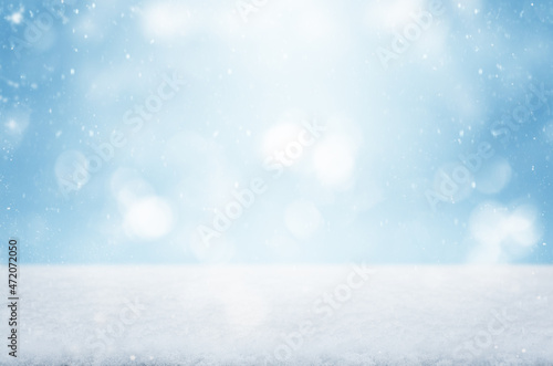 cold winter snow landscape with sky bokeh background for a traditional Christmas scene © VeKoAn