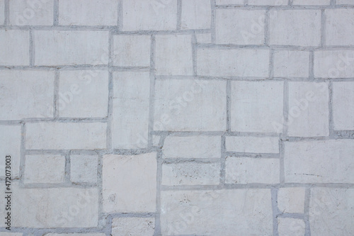 Wallpaper Mural Texture of a stone. Old stone wall texture background. Grey stone wall as a background or texture. Stone wall of natural stones in different sizes. Side covering with natural stones. Torontodigital.ca