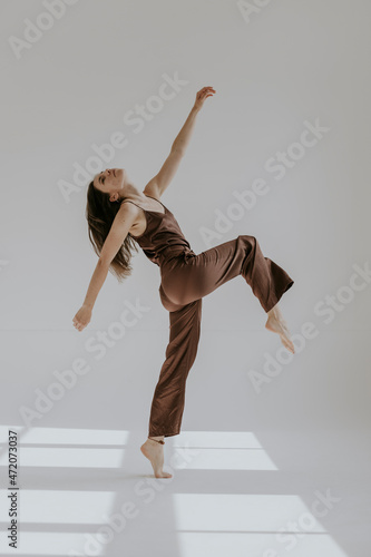 young elegant woman dancing contemporary