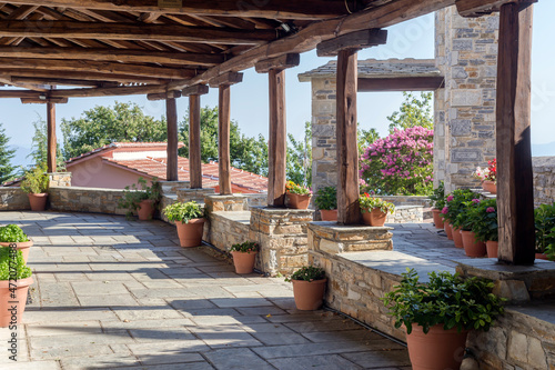 The inner courtyard of the Christian temple of Zoodochos Pigi in Vizitsa village (South Pelion, Prefecture of Magnesia, Greece) photo