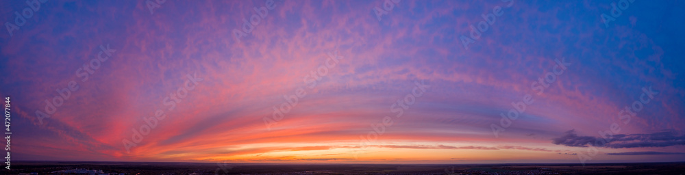 Aerial View Of Sunset Sky Background Backdrop. Top View From High Attitude In Autumn Sunrise. Amazing Natural Bright Dramatic Sky In Different Colours. Colorful Sky Background. Beauty In Nature