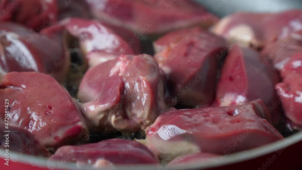 Cooking raw livers in frying pan. Delicious nutritious organic dietary turkey liver Cooking raw livers in frying pan. Delicious nutritious organic dietary turkey liver