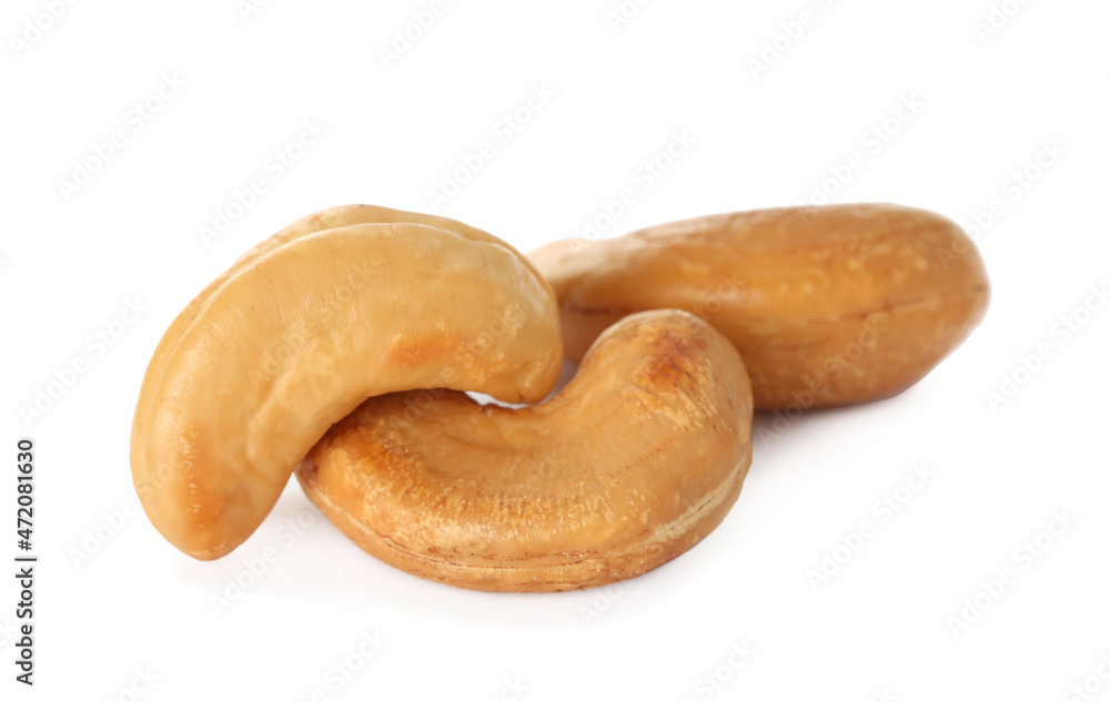 Pile of tasty organic cashew nuts isolated on white Pile of tasty organic cashew nuts isolated on white