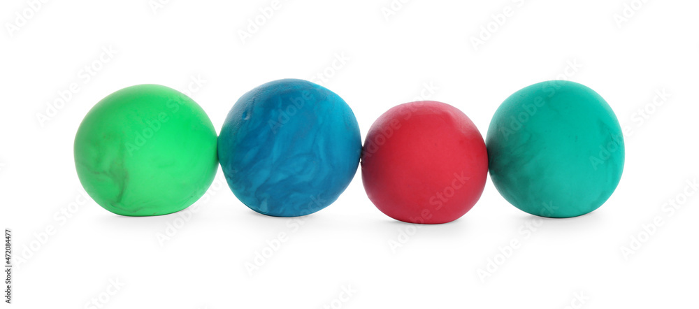 Row of color play dough balls isolated on white Row of color play dough balls isolated on white
