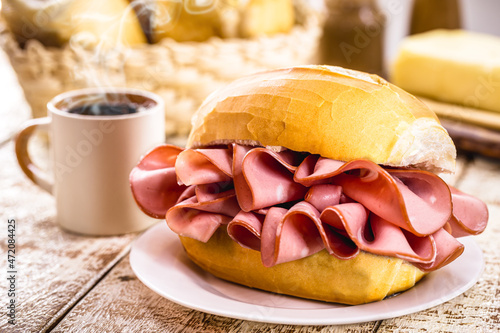 Traditional mortadella sandwich, pork served in bakeries in Brazil with black coffee photo