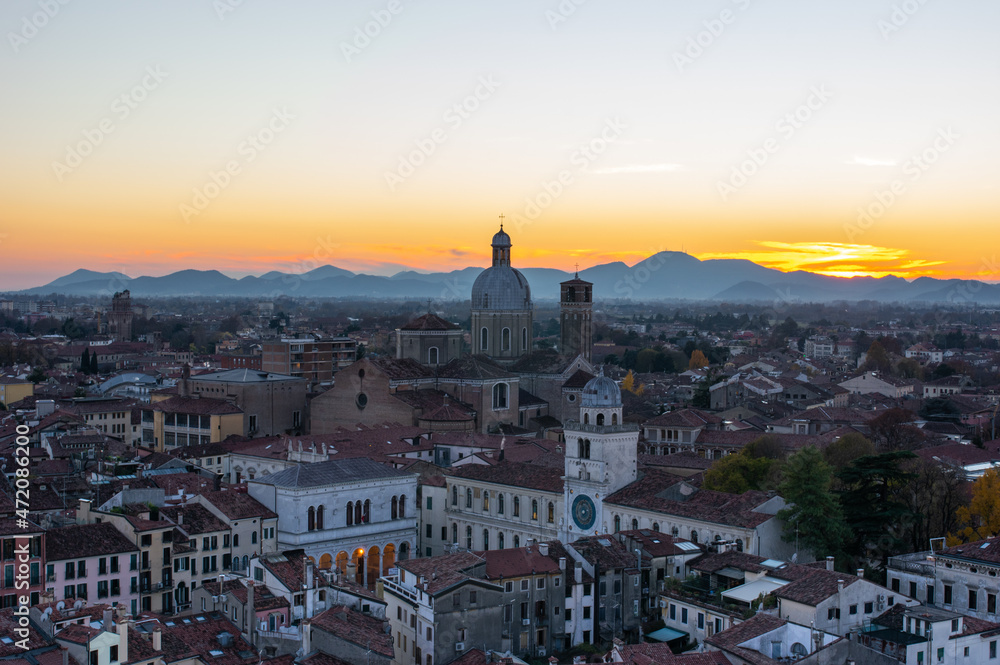 Padova city from above aerial view, duomo cathedral, mountains by the sunset