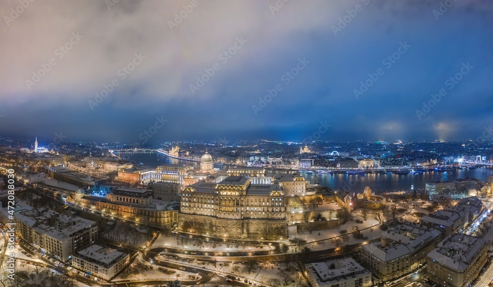 Drone photo, panorama of buda castle and Danube Budapest, Hungary. Snow and winter.