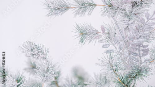 silver light Christmas snow-covered background. Space for the test