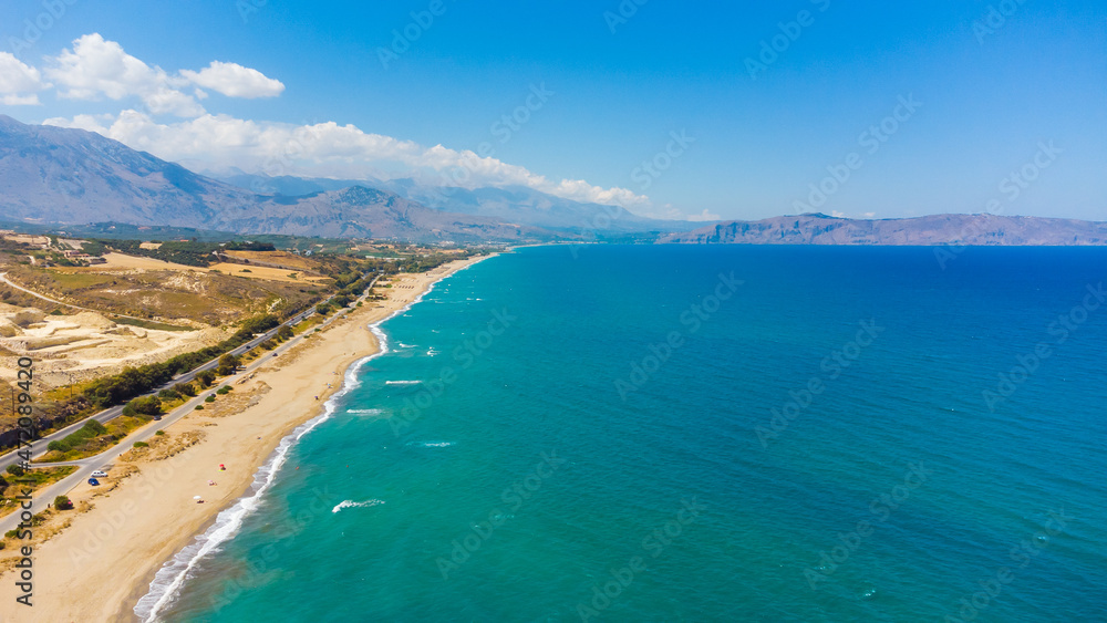 Rethymno city beach coast in Crete island, Greece from a drone.