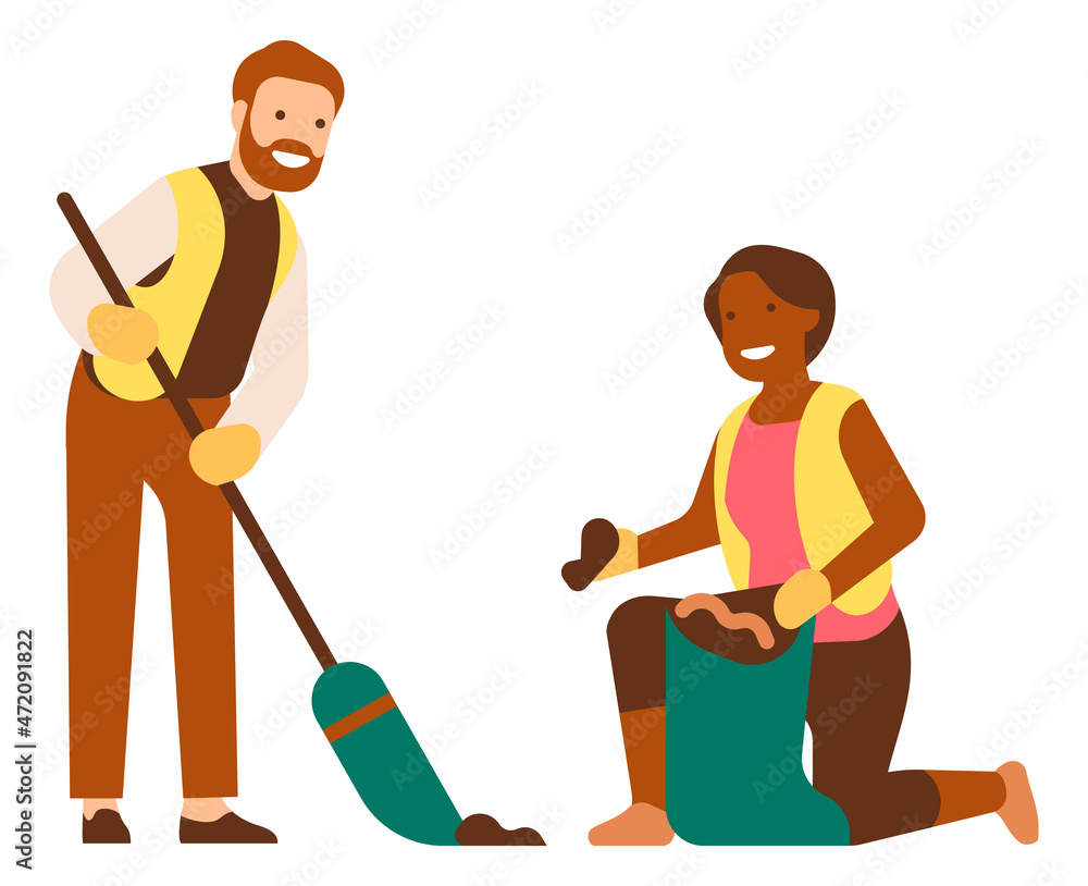 Volunteers cleaning outdoors. People gathering garbage together Volunteers cleaning outdoors. People gathering garbage together