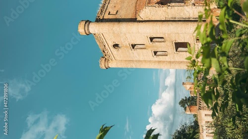 Remains Of Yastrzhembsky Estate And Park Complex. Old Five-storey Brick Water Tower. Borisovshchyna, Khoiniki District, Belarus. Vertical Shot photo