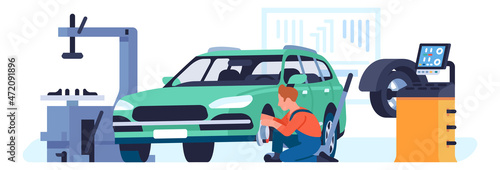 Worker changing tires. Car wheels service repair