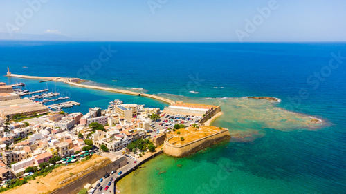 Panoramic aerial view from above of the city of Chania, Crete island, Greece. Landmarks of Greece, beautiful venetian town Chania in Crete island. Chania, Crete, Greece. © Angelov