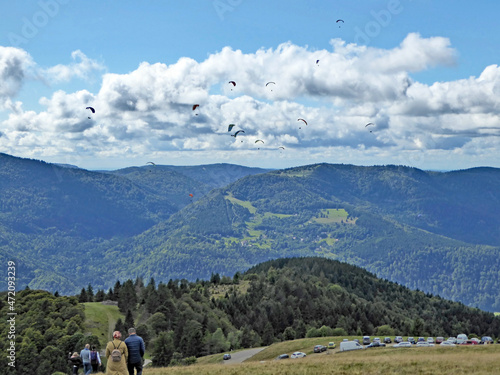 Paragliders at the Markstein in the Vosges mountains, France photo