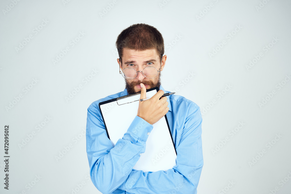 bearded man in blue shirt documents manager professional bearded man in blue shirt documents manager professional