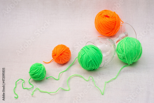 Colorful yarn. Balls and skeins of colored yarn for knitting. Creative background.