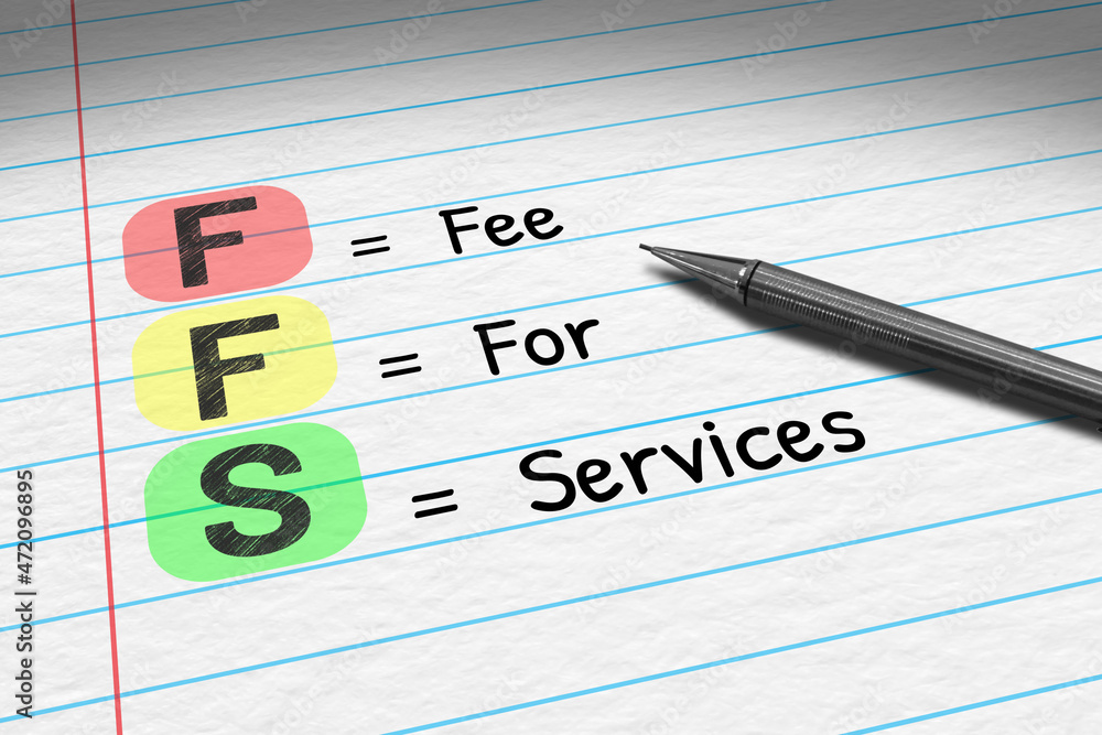 FFS - Fee For Services. Business acronym on note pad. FFS - Fee For Services. Business acronym on note pad.