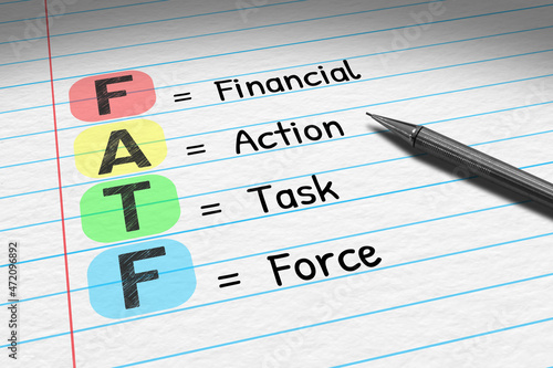 FATF - Financial Action Task Force. Business acronym on note pad.