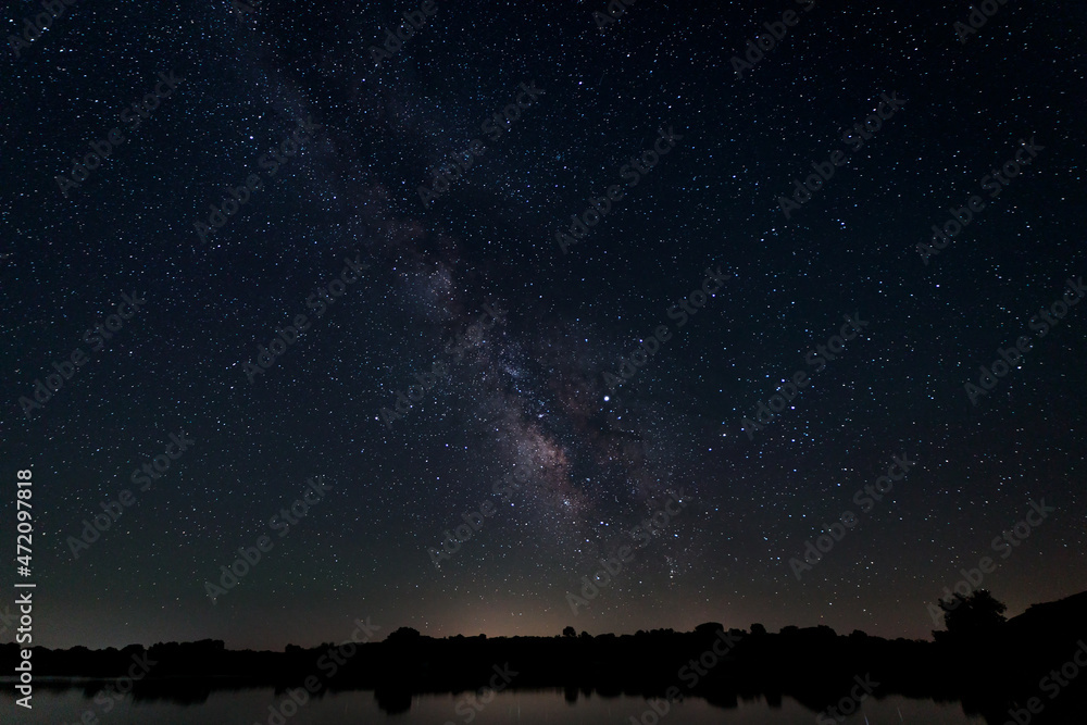 Night photography with Milky Way in Natural Area of Barruecos. Extremadura. Spain. - obrazy, fototapety, plakaty 