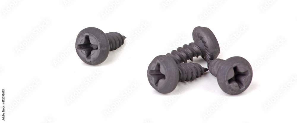 black small screws isolated on white black small screws isolated on white