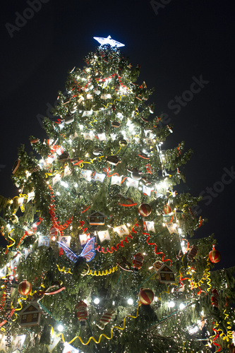 Christmas tree with decorations in the New Year Eve night