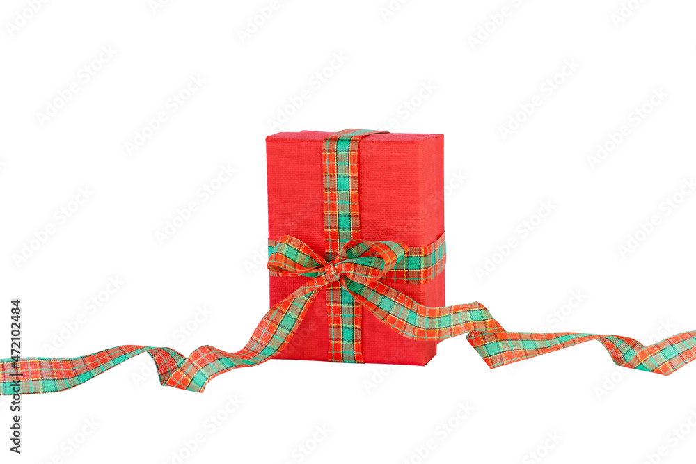 Red gift box with long ribbon and bow isolated on white stock photo Red gift box with long ribbon and bow isolated on white stock photo