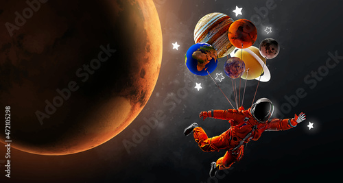 Astronaut with balloons and planets on the background of the mars and space. Vector illustration