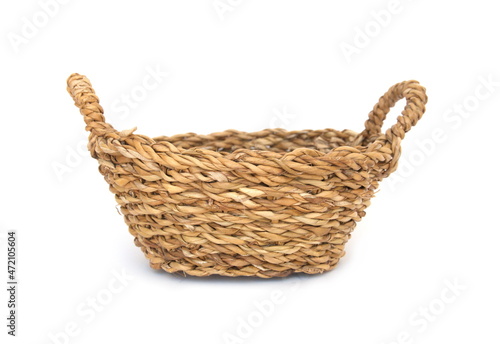 Empty woven basket on white background