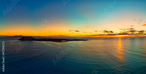 Panoramic view of the sunrise over Isla de Lobos island Fuerteventura