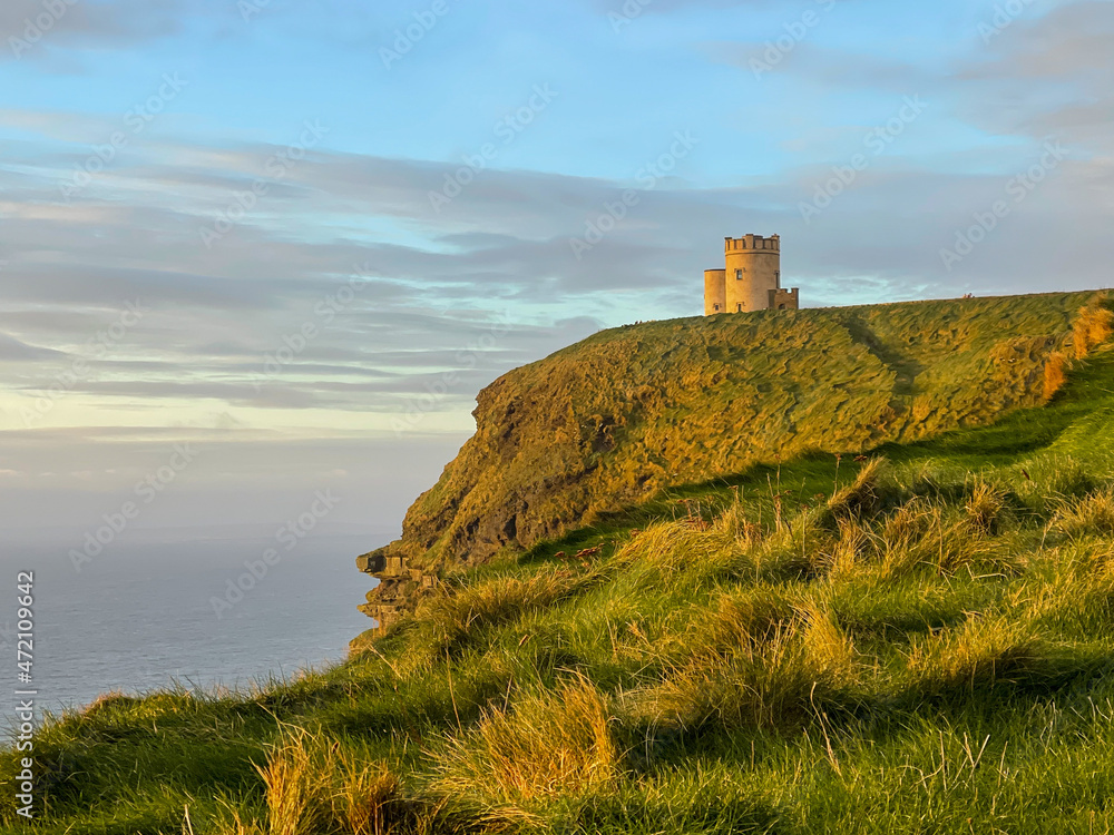 Old stone tower on cliffs in Ireland