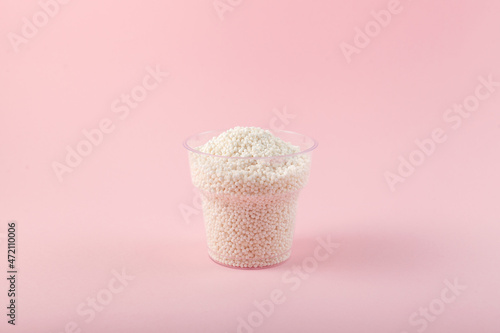 White sago pearls or tapioca pearl in disposable plastic cup.  Tapioca ball or boba for bubble tea