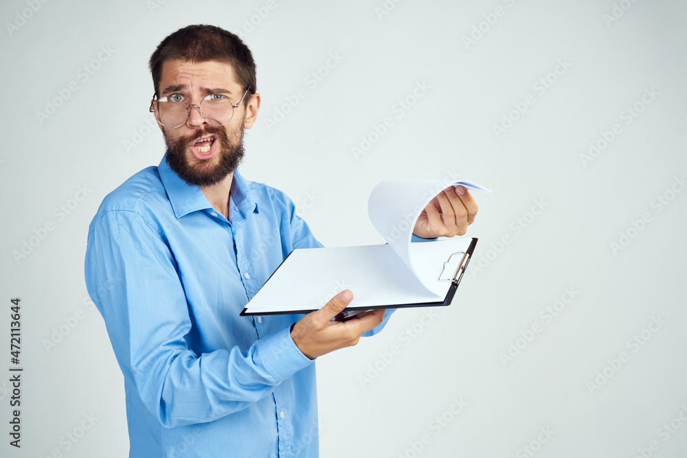 bearded man in blue shirt documents manager professional bearded man in blue shirt documents manager professional