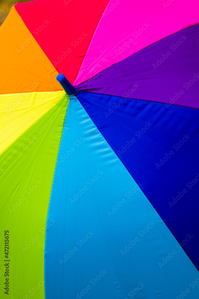 Colorful close up abstract of rainbow umbrella background