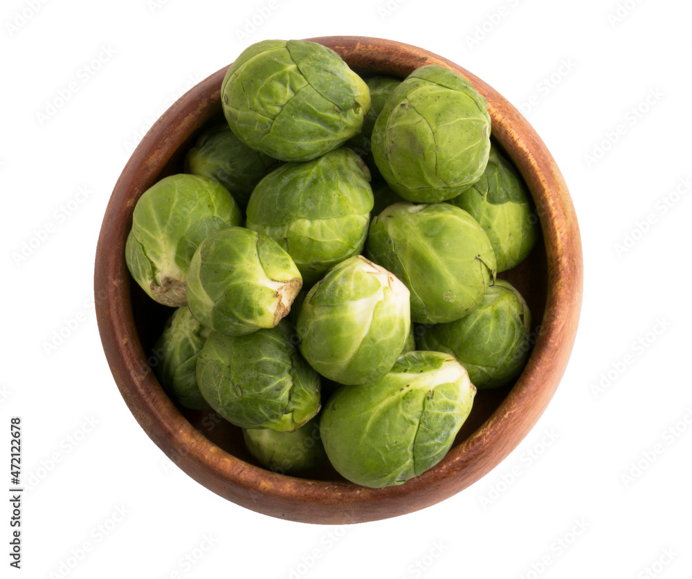 a bowl of brussels sprouts on a white background a bowl of brussels sprouts on a white background