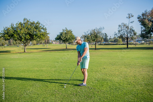 guy playing game on green grass. summer activity. professional sport outdoor.
