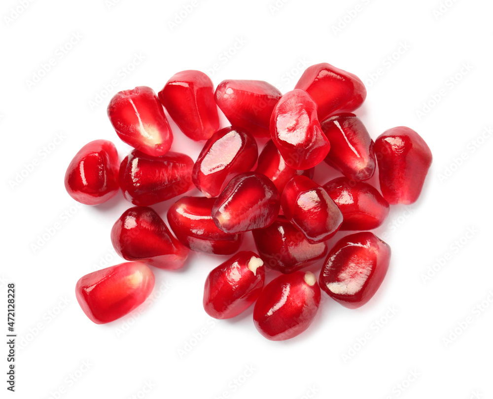 Tasty pomegranate seeds on white background, top view Tasty pomegranate seeds on white background, top view