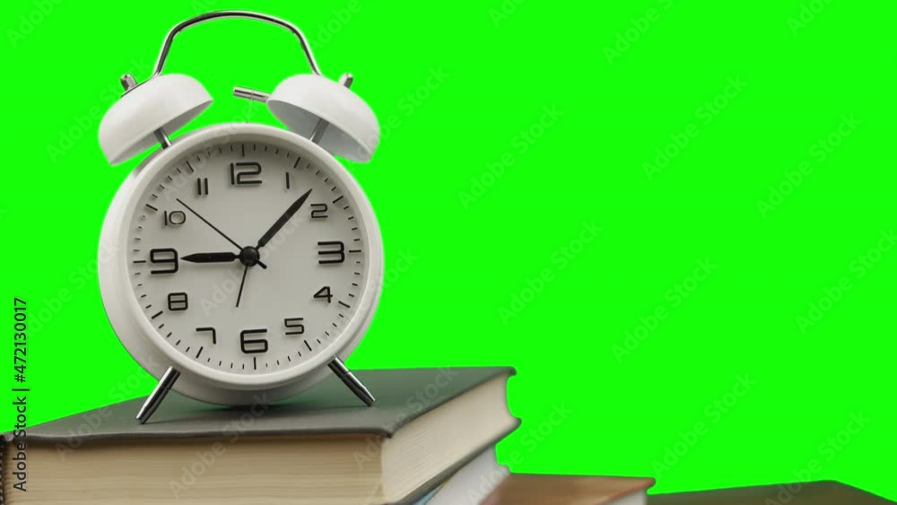Time Lapse 4K of close up traditional alarm clock with green screen background and copy space shows concept of time passing in waking up and rush hour morning for doing work and business. Time Lapse 4K of close up traditional alarm clock with green screen background and copy space shows concept of time passing in waking up and rush hour morning for doing work and business.